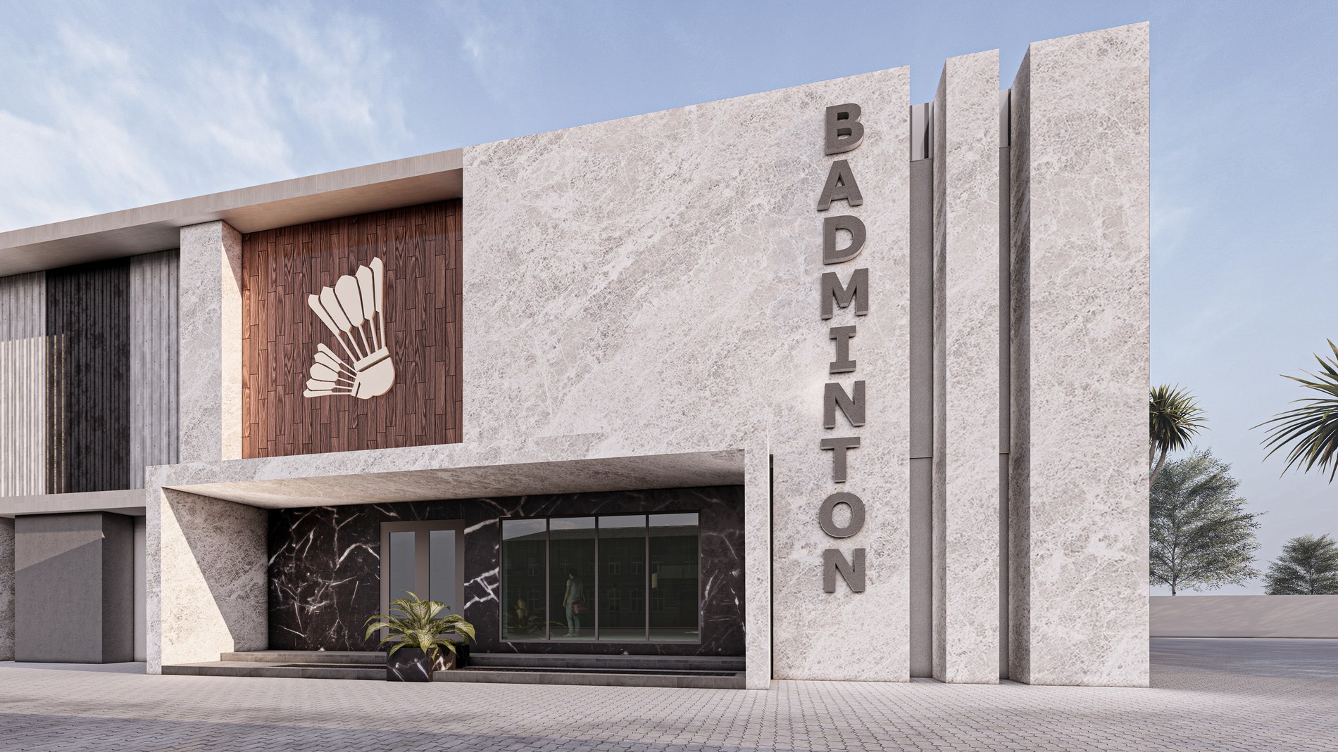 Stone-framed main entrance of the Badminton Court