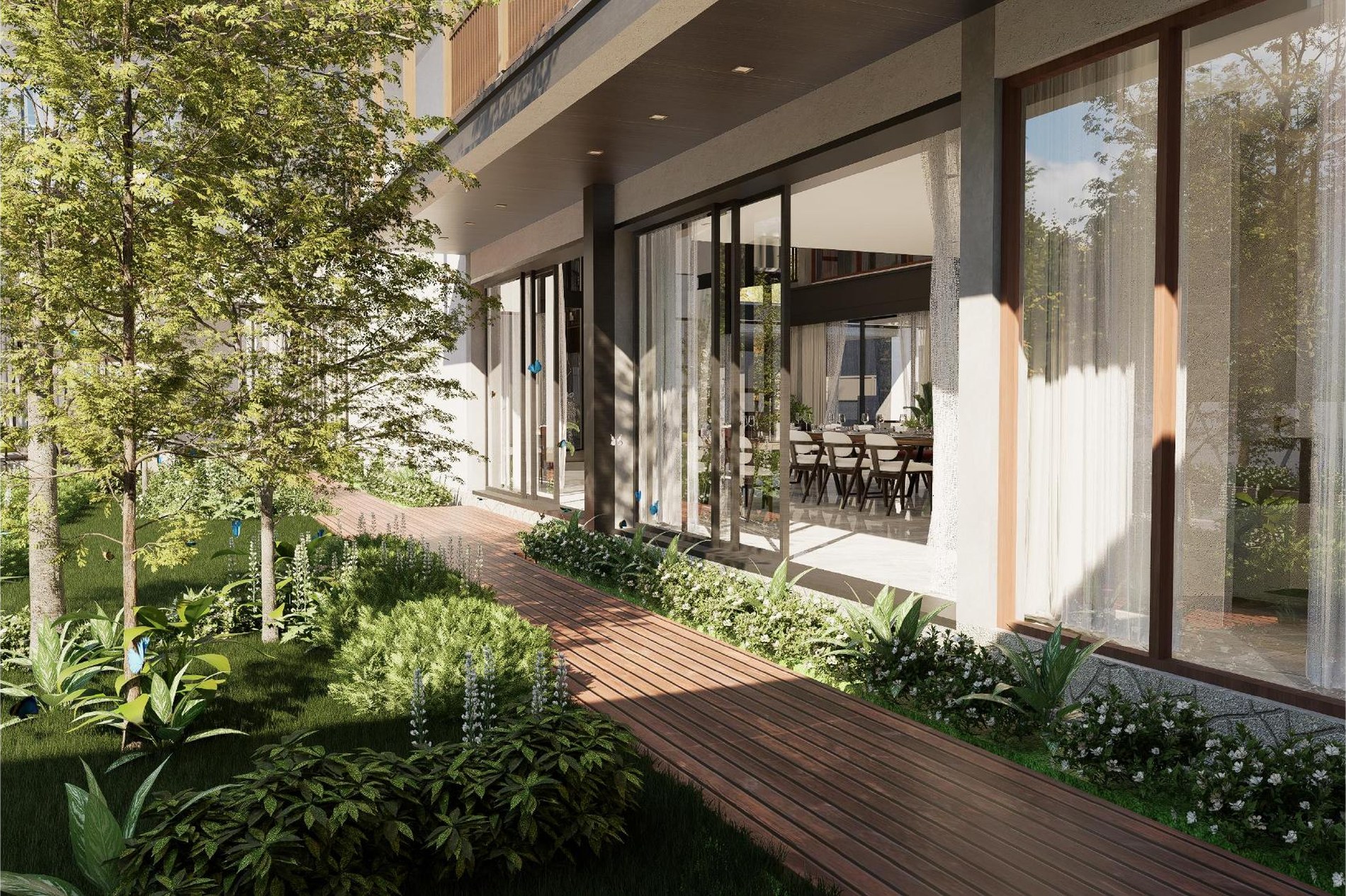 Landscaped garden walkway beside full-height glazing