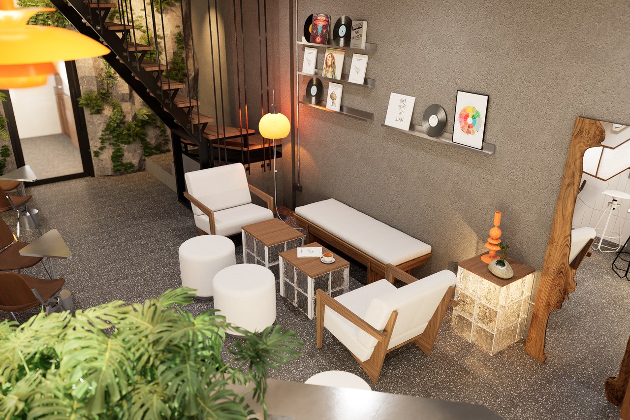 Seating beside the planted stair and Twotone identity wall